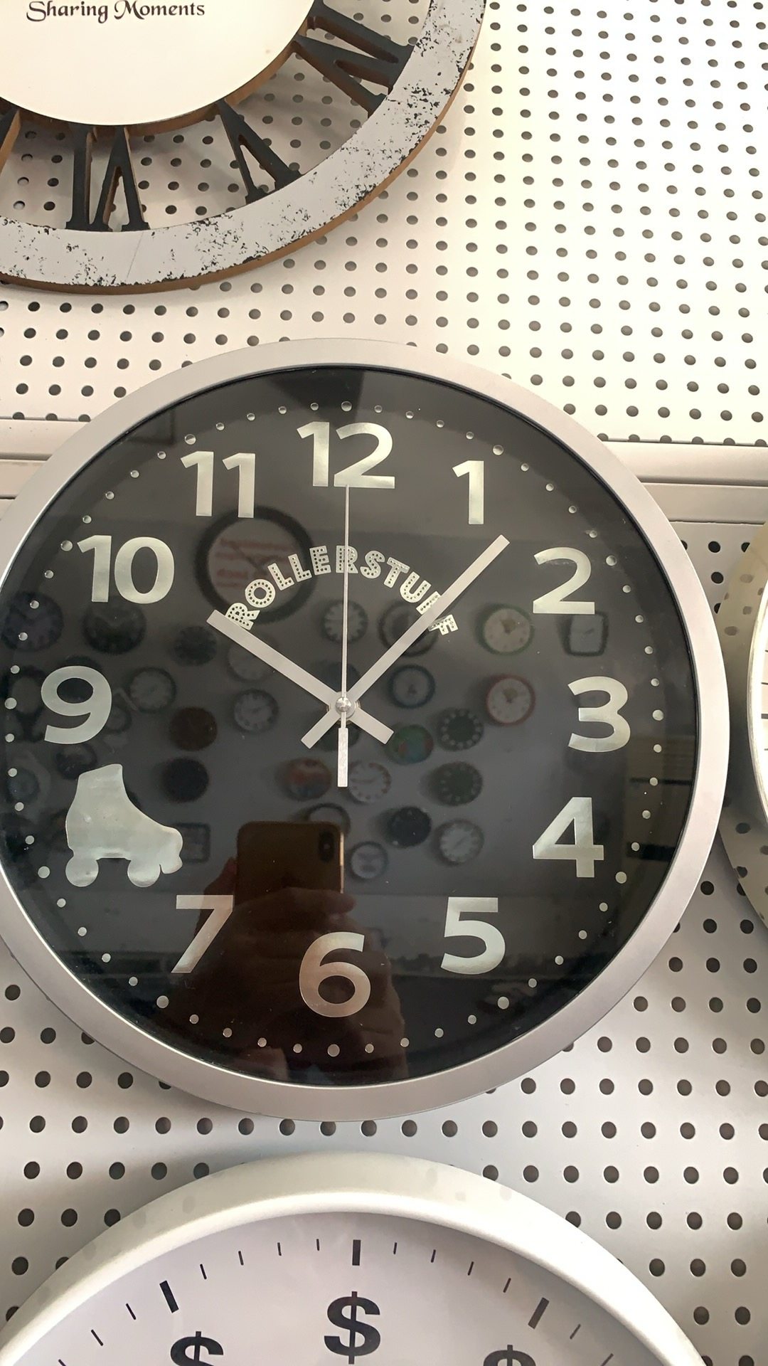 Rollerstuff custom wall clock with silver frame and skate icon