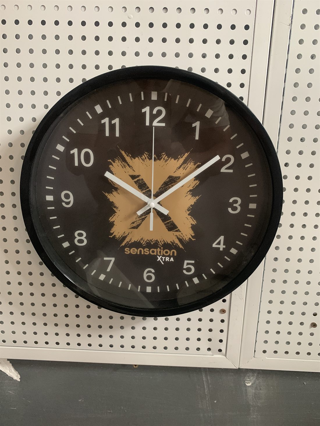 Sensation Xtra black custom logo wall clock with bold center graphic