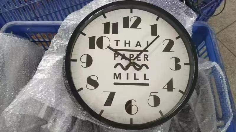 Thai Paper Mill custom logo wall clock with mixed numeral styles
