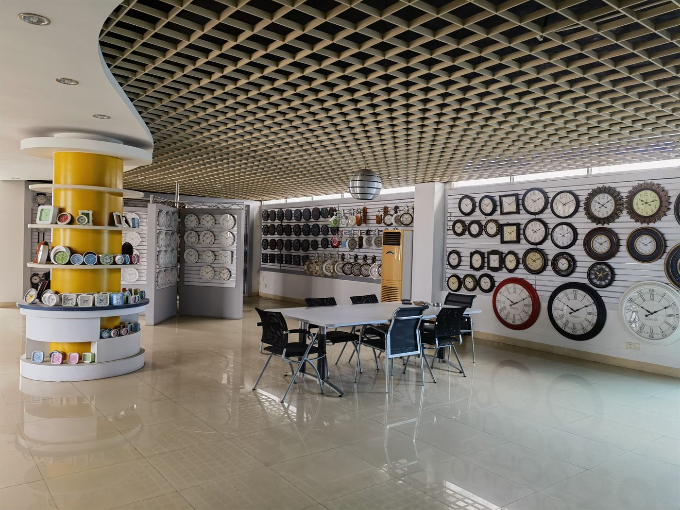 Bonmo Clock showroom meeting area with wall clock samples