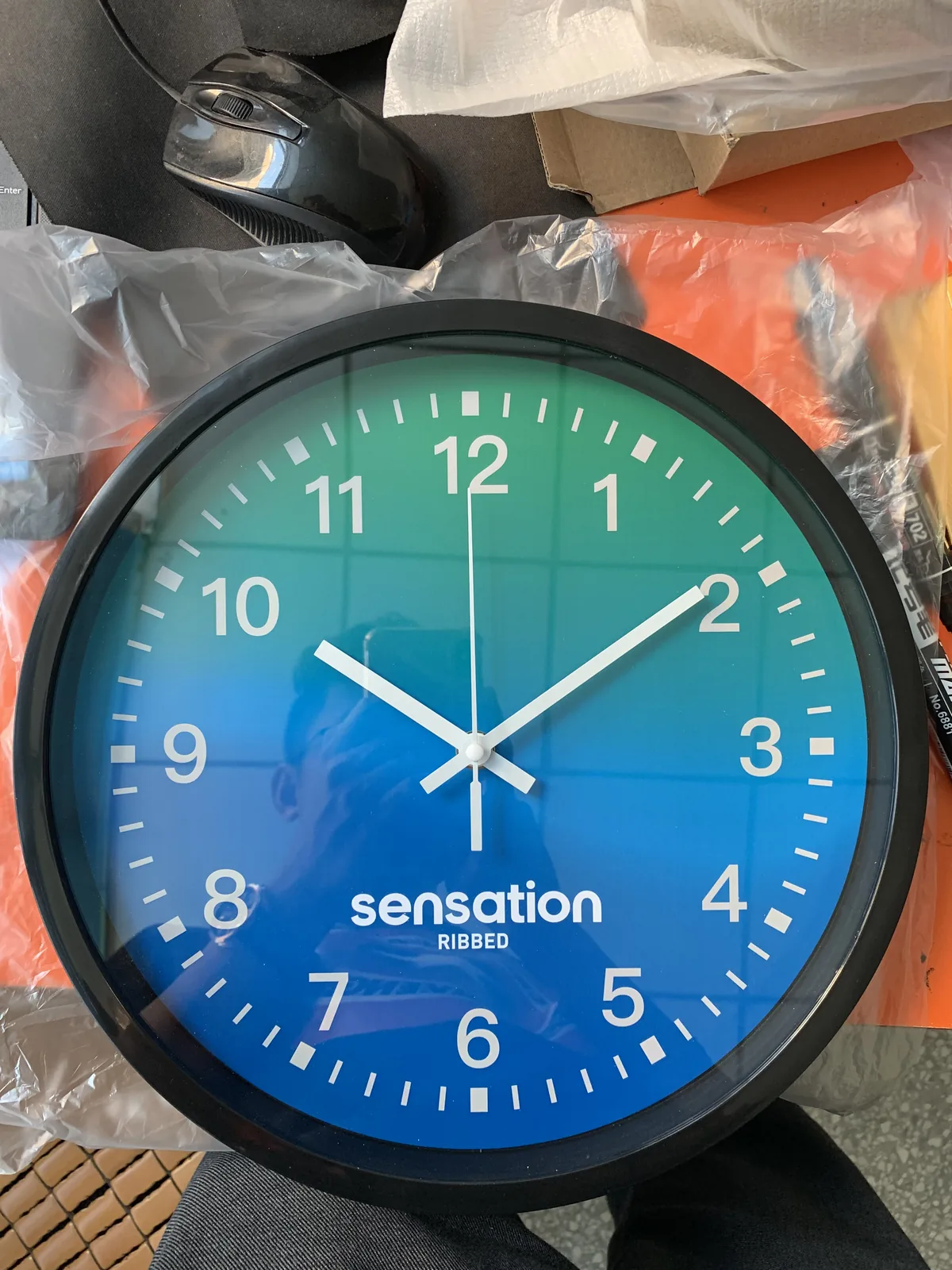 Real blue custom logo wall clock with white numerals