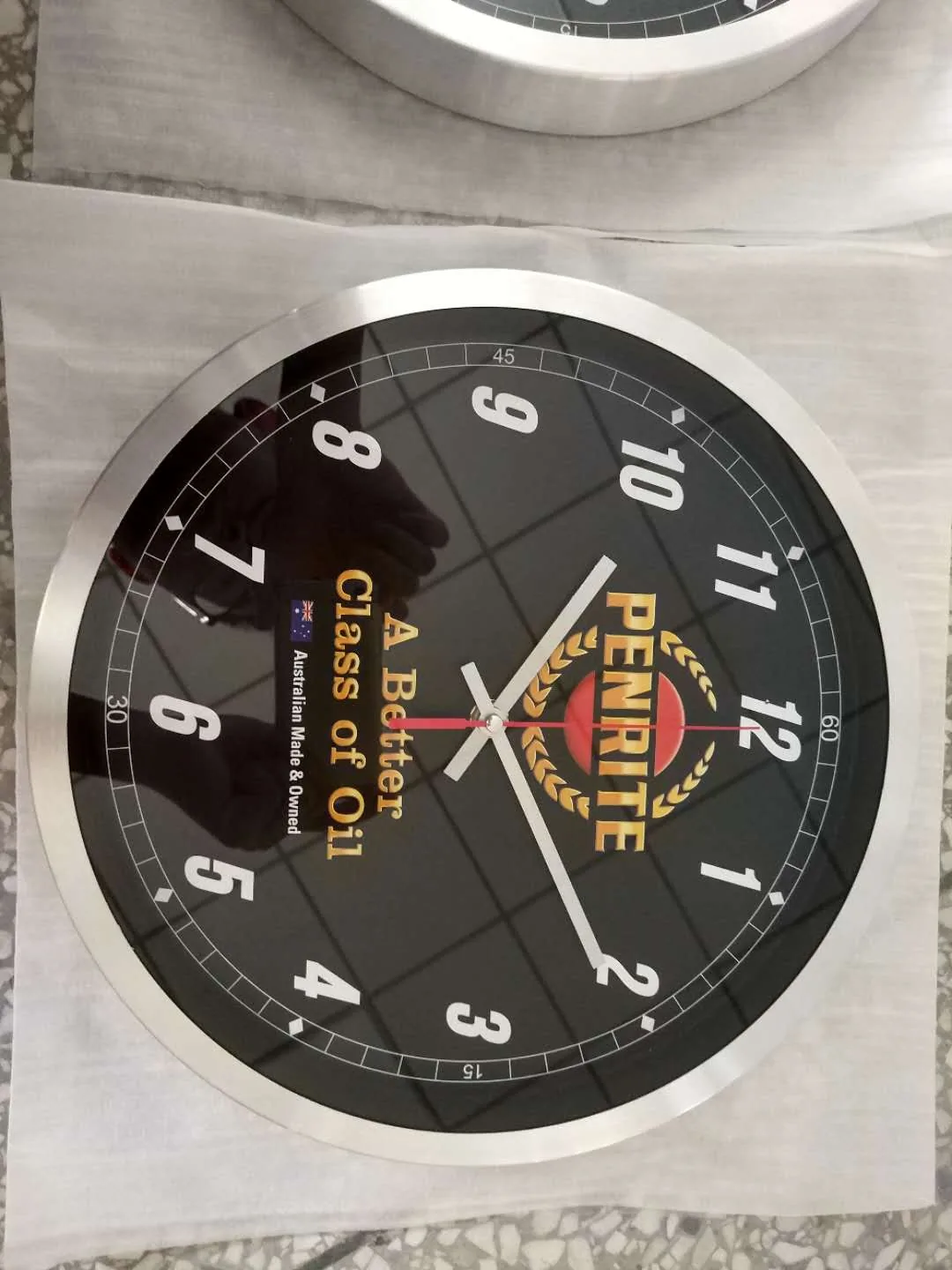 Real black custom logo wall clock with silver frame