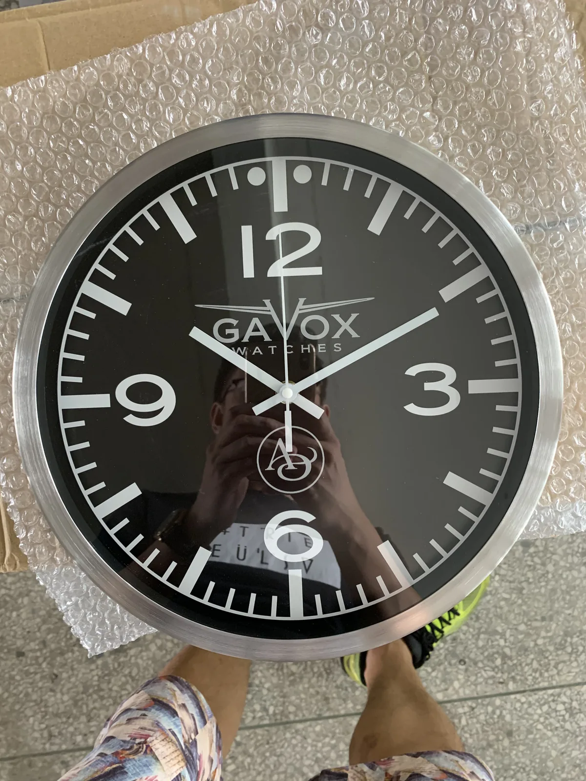 Real black and silver custom logo wall clock with raised markers